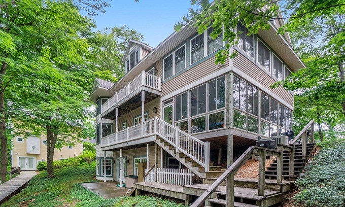 Macatawa House | Delightful Private Wooded Setting Stunning Harbor Views, Private Beach Access, Tennis