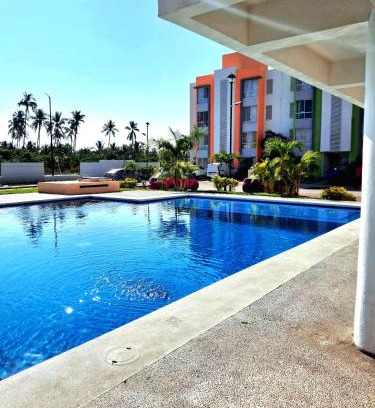 Acapulco Apartment | Departamento En Acapulco Diamante con Alberca, Camastros y Hermosos Jardines