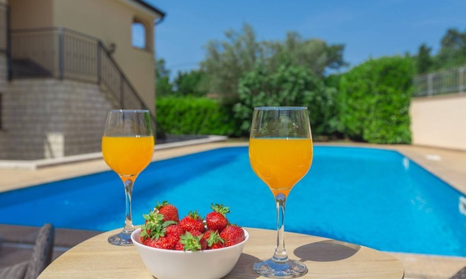 Cervar Apartment | Fantastic flat just 250 metres from the beach with sea views, pool, barbecue area, private parking space