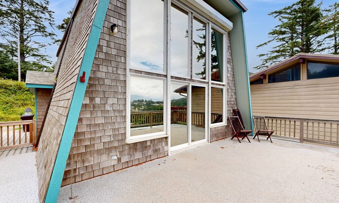 Oceanside House | Hillside retreat with 2 decks & ocean views - half mile to beach
