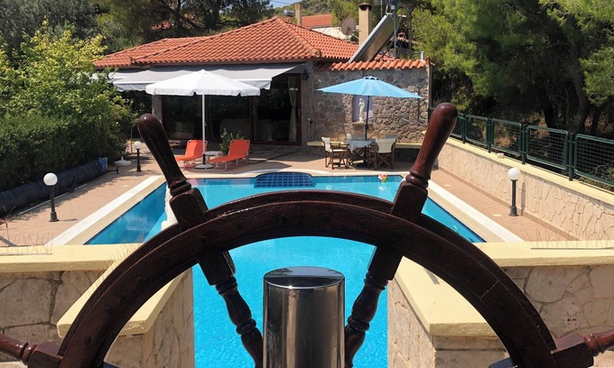 Vagia Villa | It is a stone property of 75.22 sq.m. with a wooden roof. Swimming Pool & B.Q.