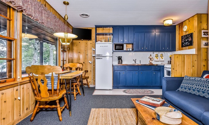 Presque Isle House | Lakefront suite at a vintage resort with communal dock, rowboats & firepit