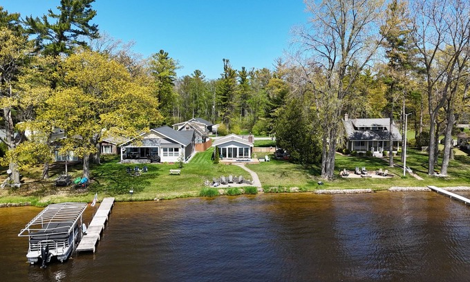 Oscoda Cottage | Loon Lodge - Super Cute, Lakefront, Bonfire Ring, and Private Dock!