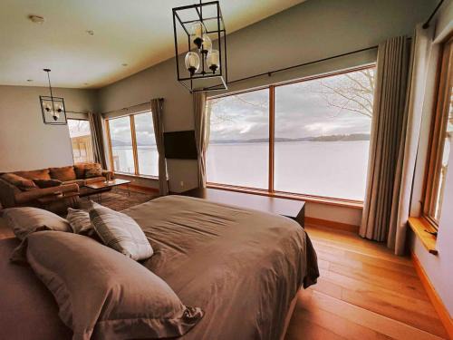 Newport Center Apartment | Luxury Lake Memphremagog Loft - 2 Bedrooms Water Views Firepit & Dock near Jay Peak