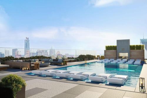 Rainey Street Historic District House | Modern 1BR Condo on Rainey St with Pool and Views