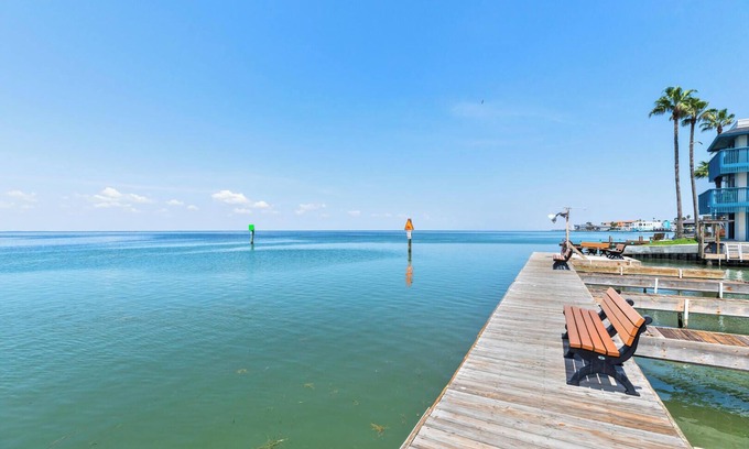 South Padre Island Condo | Quiet Bayfront Condo w/Boat Slips & Fishing Pier!