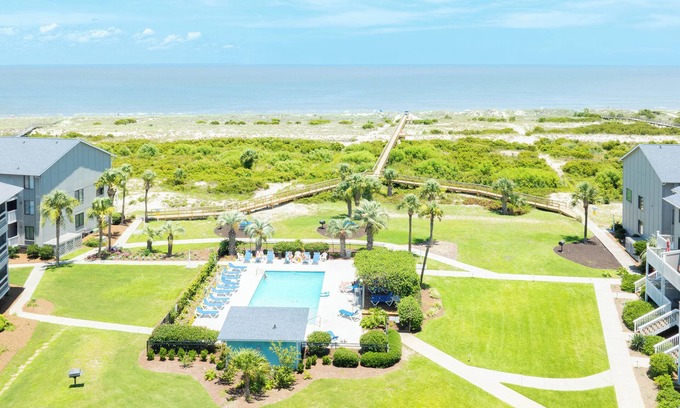 Oceanmarsh Subdivision Condo | Relax in Coastal Comfort – 2BR/2.5BA Harbor Island Retreat