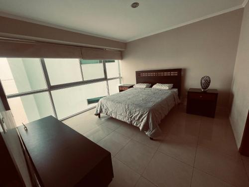 Las Penas Apartment | Suite frente al río en Puerto Santa Ana Riverfront