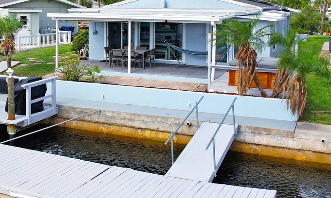 Flor-a-mar House | The BoatHouse: Bright Beautiful Home w/Hot Tub, Kayaks and Boat Dock