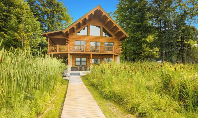 Bellaire House | THE CLAM SHELL Log Home on Clam Lake | Hot Tub!