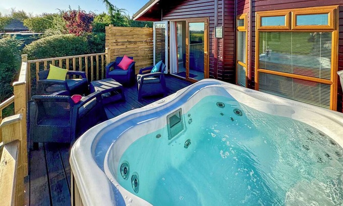 Raywell Ski Chalet | This deluxe two bedroom lodge even has its own games den.