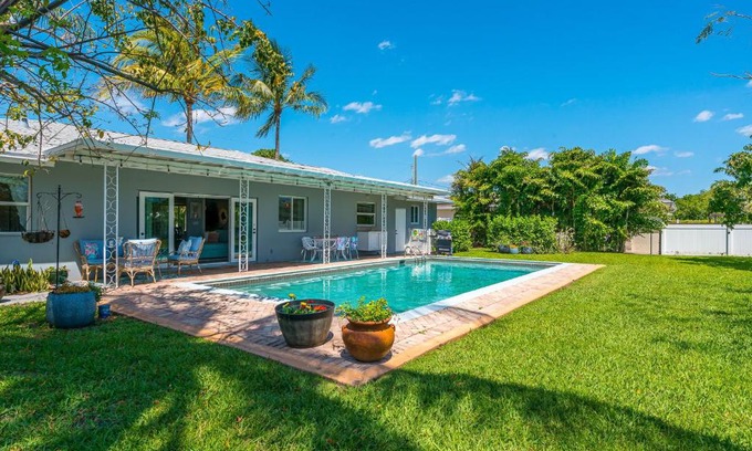 West Palm Beach Villa | Vibrant Pool Home! Kayak, Firepit & Playground!
