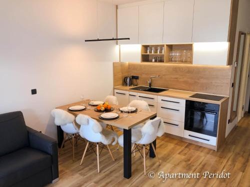 Kranjska Gora Apartment | Villa Mojca - Apartment Peridot in the Center with Private Indoor Parking