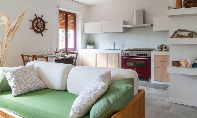 Cala Gonone Apartment | Welcomely - Green and Blue Ground Floor