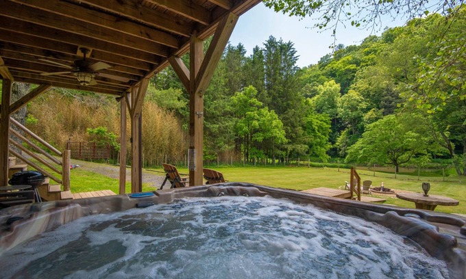 Lansing Cabin | Woodsy Retreat with Hot Tub | Dogs Welcome | On River Time