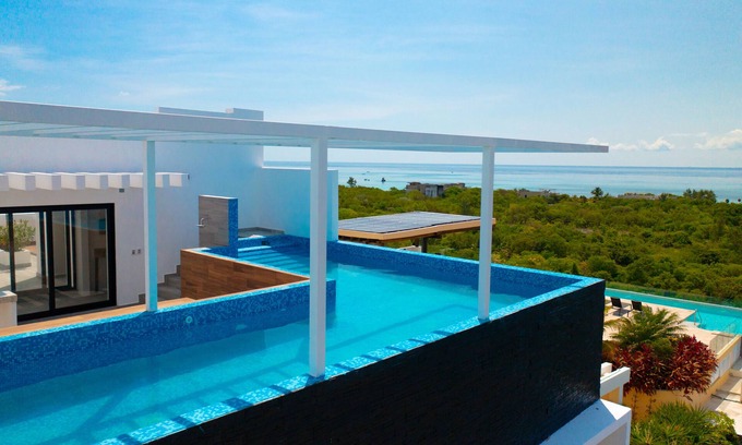 Luis Donaldo Colosio Apartment | XKAA Ocean View Condos By Smart Rentals