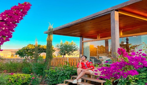Wooden villa with garden and pool view