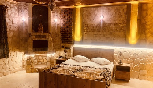 Room with Jacuzzi and Fireplace
