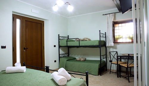 Comfort Quadruple Room, Garden View