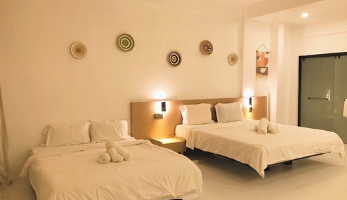 Deluxe Room, Multiple Beds, Garden View, Garden Area