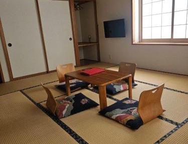 Quadruple Room with Shared Bathroom