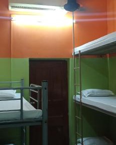 Single Bed in Male Dormitory Room with Shared Bathroom