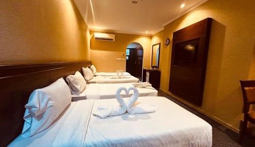 Quadruple Room with Private Bathroom