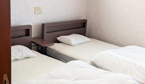Quadruple Room with Shared Bathroom