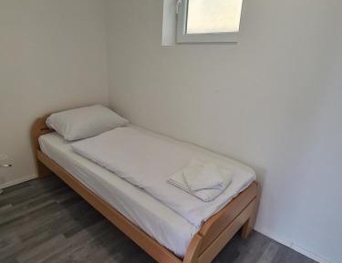 Two-Bedroom Family Apartment with Shared Patio