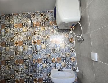Basic Triple Room with Shared Bathroom