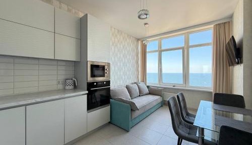 One-Bedroom Apartment with Sea View
