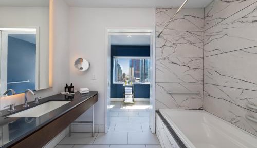 Two-Bedroom Premier Corner Suite with Tub and City View