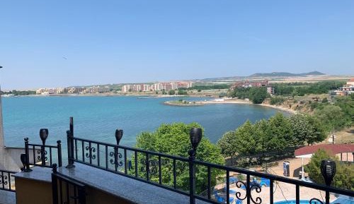 One-Bedroom Apartment with Balcony and Sea View
