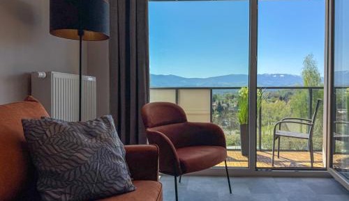 One-Bedroom Apartment with Balcony and Mountain View  