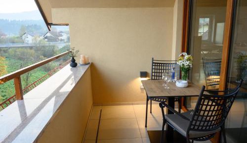 Two-Bedroom Apartment with Balcony