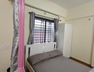 Three-Bedroom Apartment with Balcony