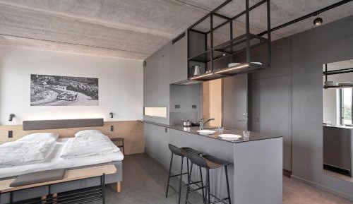 Larger Family Studio with One King and One Non-Private Sofa Bed