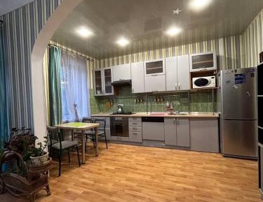 Four-Bedroom Apartment with Balcony 