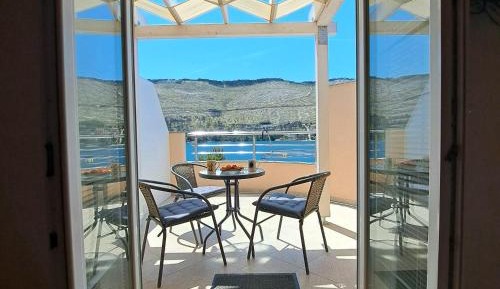 One-Bedroom Apartment with Balcony and Sea View