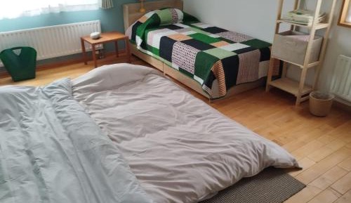 Quadruple Room with Private Bathroom