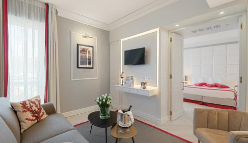 Deluxe Suite with Balcony and City View