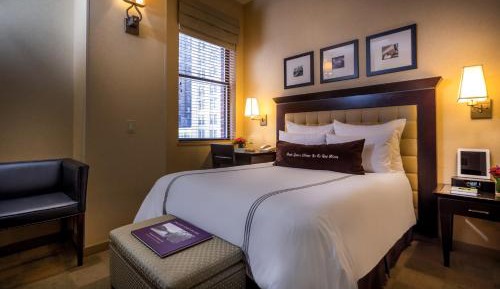 Petite Room with One Full Bed
