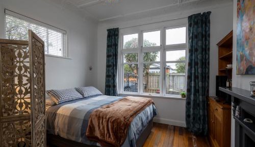 Queen Room with Shared Bathroom
