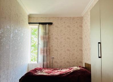 Quadruple Room with Shared Bathroom