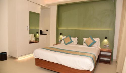 Deluxe Double Room with 10% discount on laundry & 10% Off on Access to Sai Teerth 