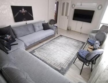 Three-Bedroom Apartment with Balcony