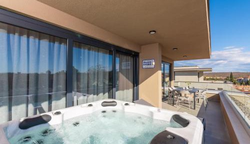 Three-Bedroom Apartment with Sea View