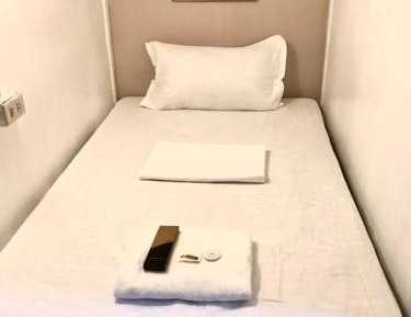 Single Bed in Dormitory Room