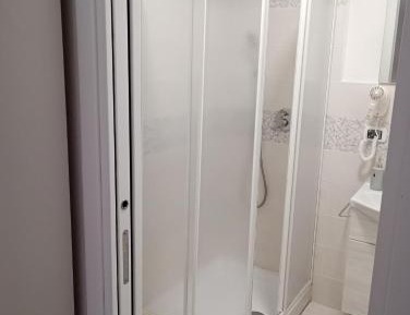 Quadruple Room with Private Bathroom