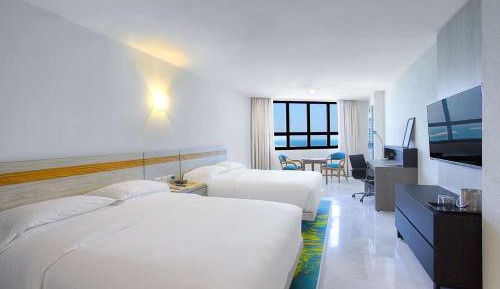 Queen Room with Two Queen Beds and Beach View